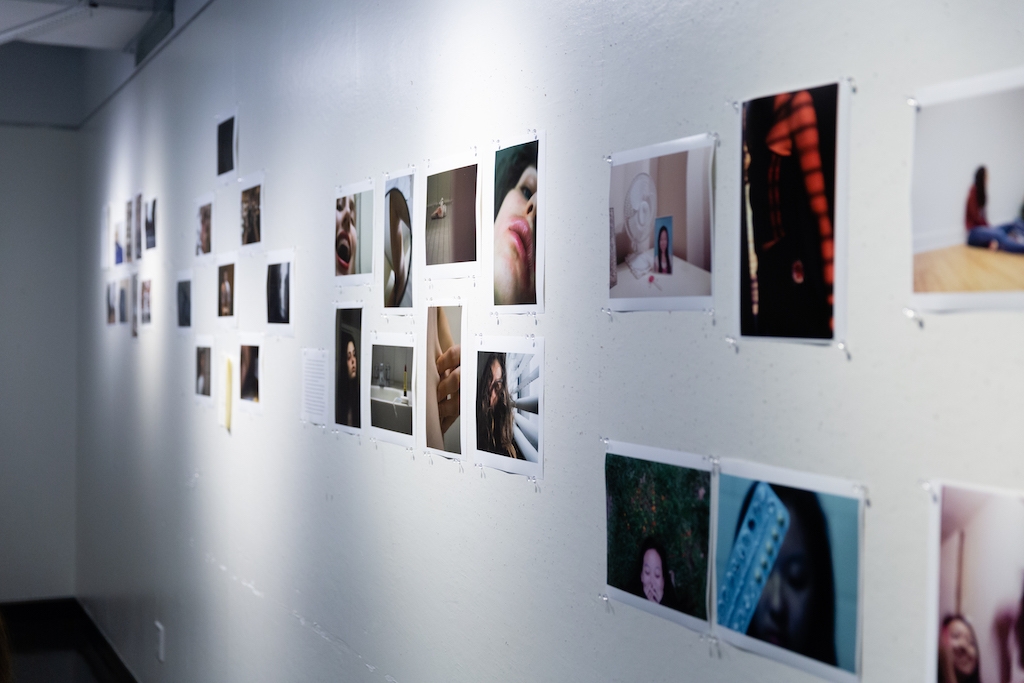Photos on display on the walls of the Department of Photography and Imaging